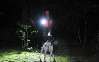 Dog_handler_1 Professional schweiss dog handler using Suprabeam headlamp and flashlight