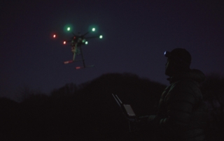 Drone pilot with headlamp Professional drone pilot working on a dark morning with his S4 headlamp