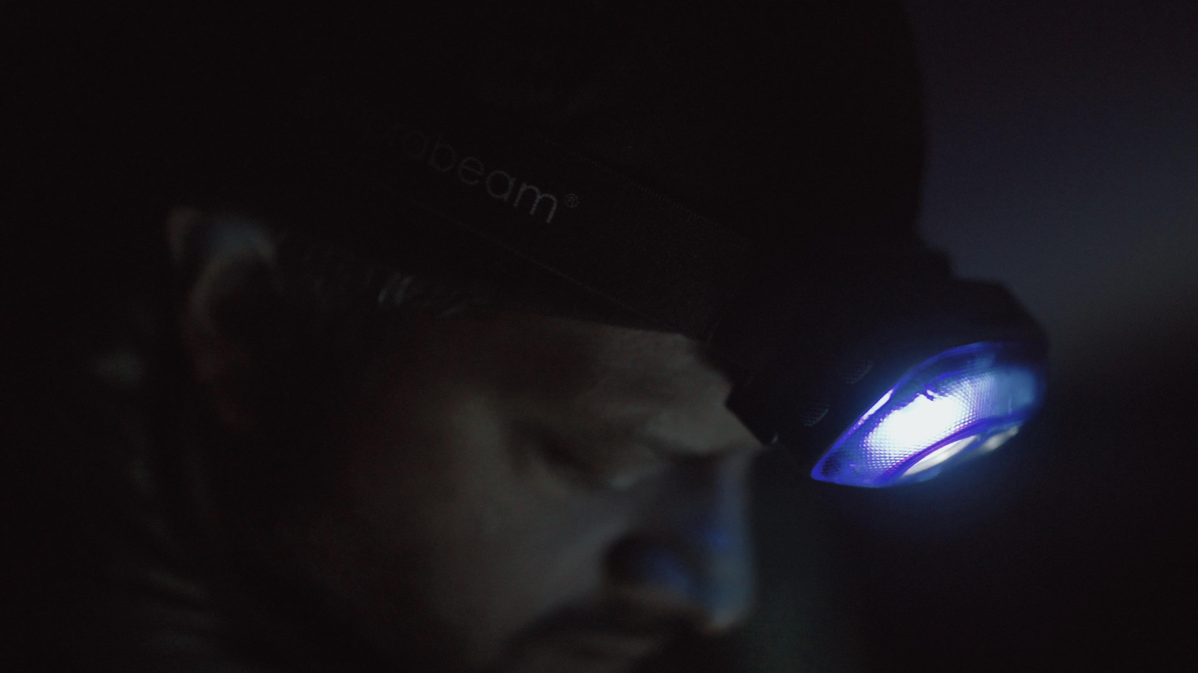 Drone pilot with headlamp Professional drone pilot working on a dark morning with his S4 headlamp