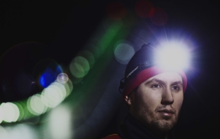 professional cross country skj Professional cross country skiier with V3pro rechargeable headlamp