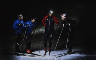 professional cross country skiiers Cross country skiiers talking during evening training