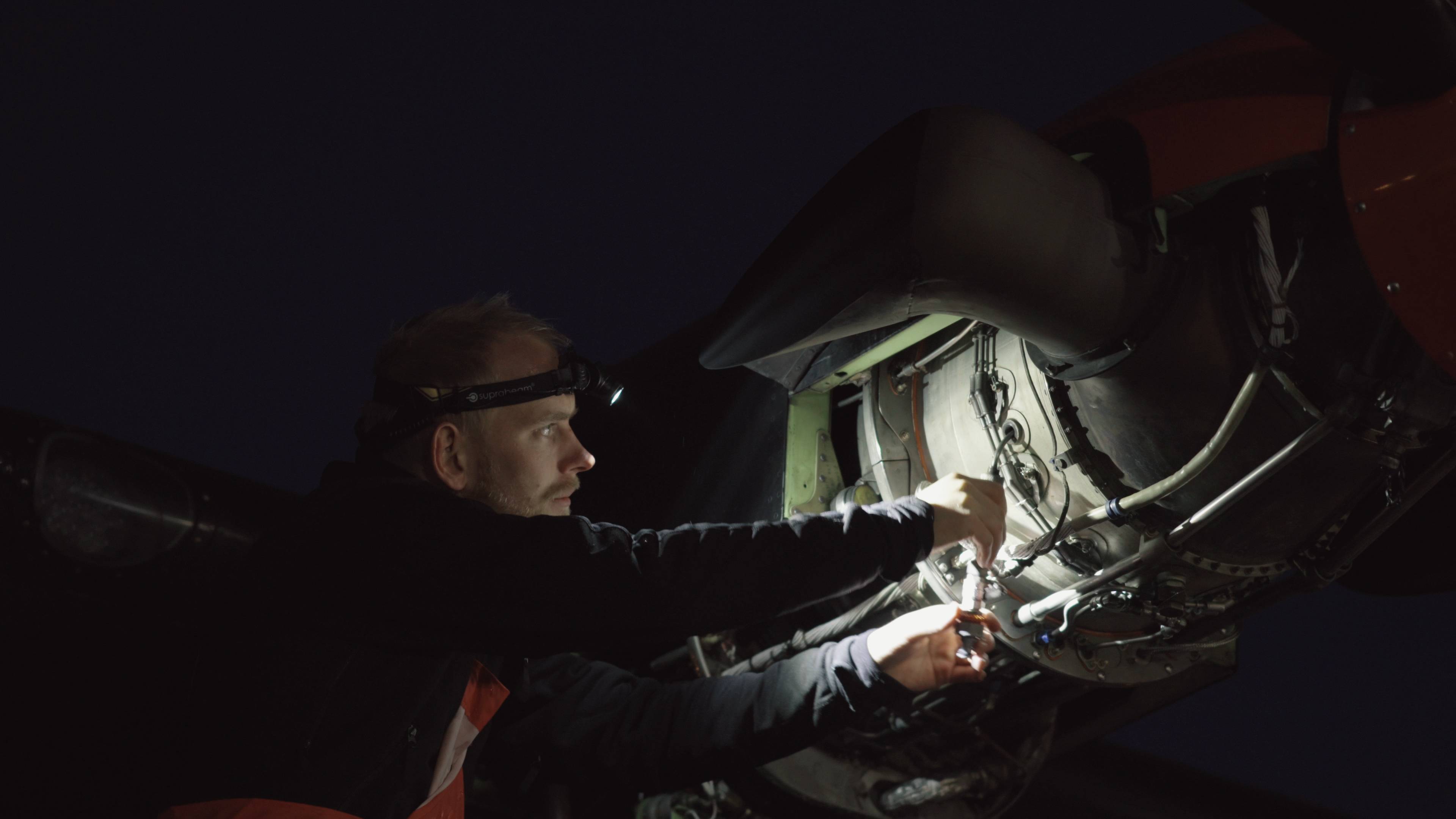 seaplane mechanic 16 Flight mechanic inspecting seaplane before take off using the V3pro rechargeable headlamp