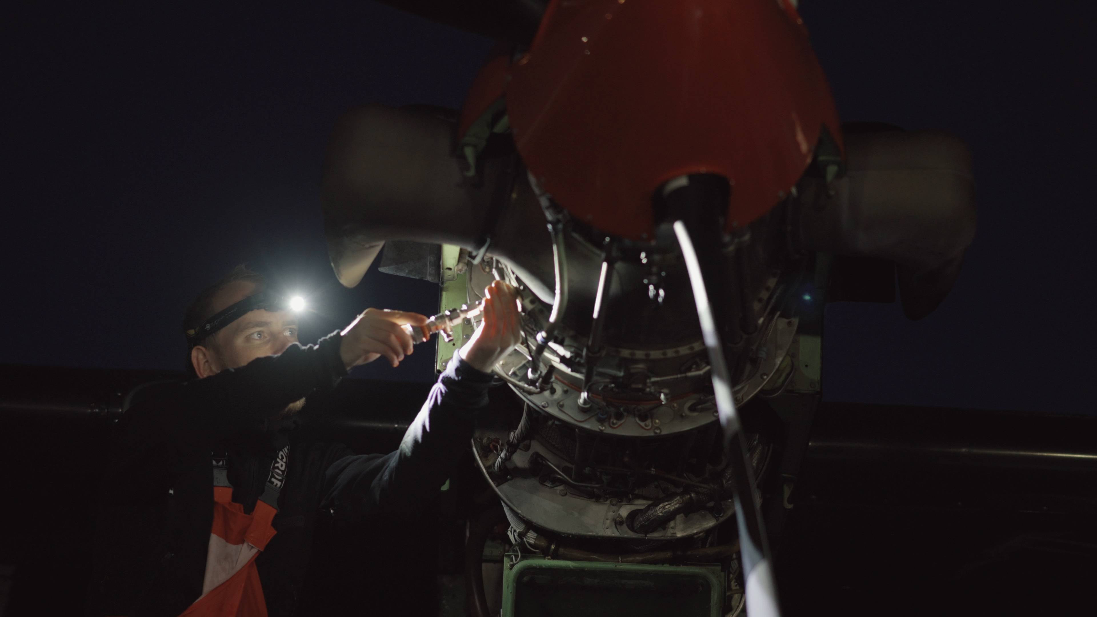 seaplane mechanic 16 Flight mechanic inspecting seaplane before take off using the V3pro rechargeable headlamp