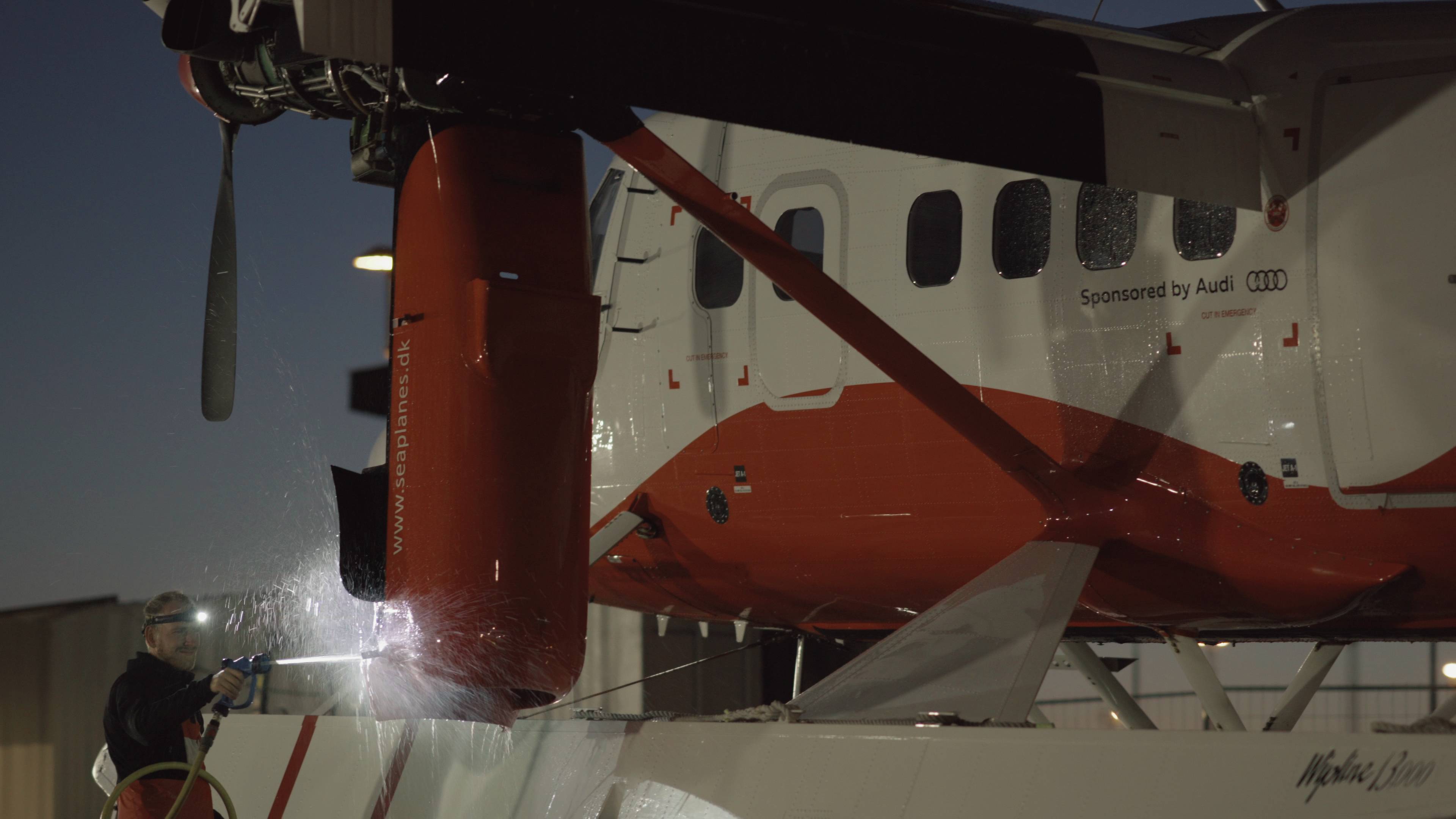seaplane mechanic 15 Flight mechanic inspecting seaplane before take off using the V3pro rechargeable headlamp
